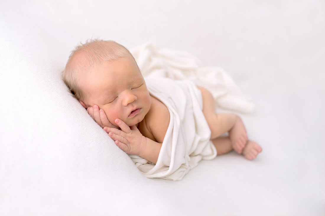 Baby boy sleeping in Stockport photography studio
